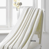 A white Cellular Blanket used for layering bedding to regulate bed temperature from Allergy Best Buys